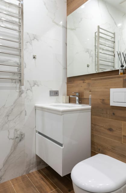Meuble WC suspendu sur mesure SCARS, design compact avec tablette bois.